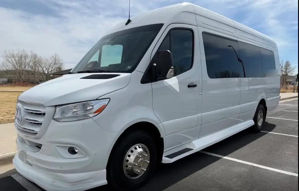 Castle Rock 16 passenger white Sprinter limo bus