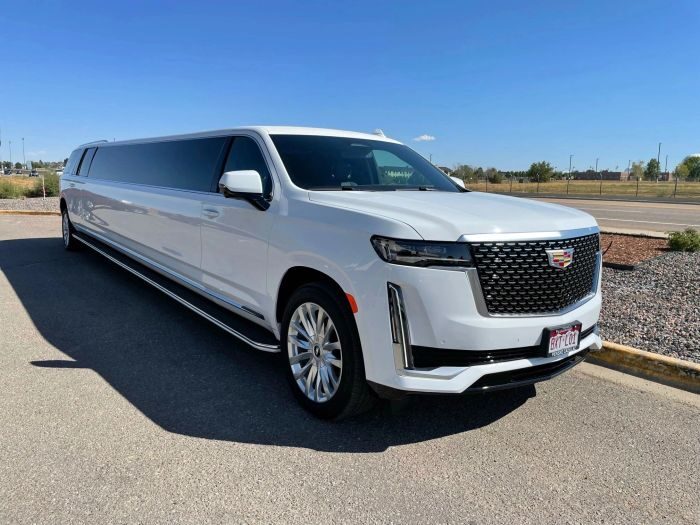 White Escalade stretch limo – Castle Rock party bus rental